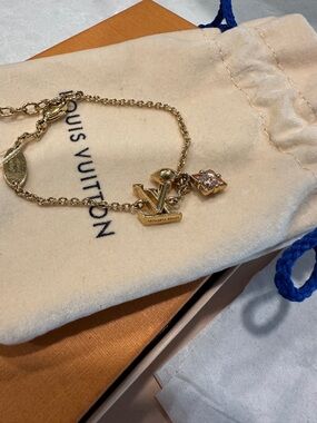 Louis Vuitton Gold and Pink Crystal LV Charm Bracelet